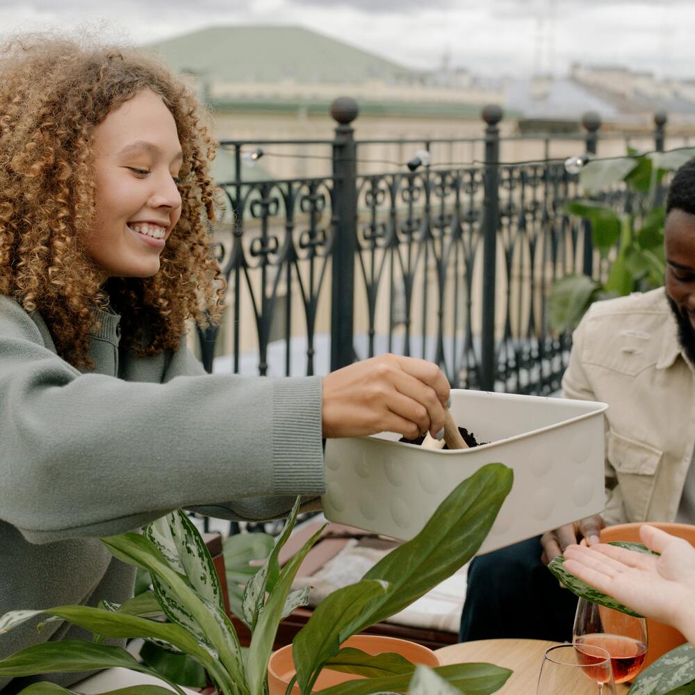 lady caring garden plant