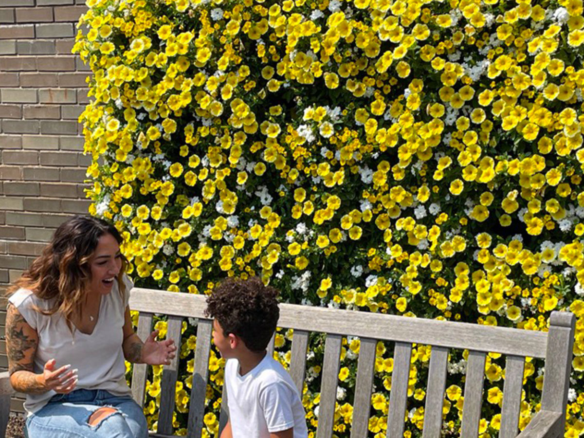 Yellow vertical garden woman and boy