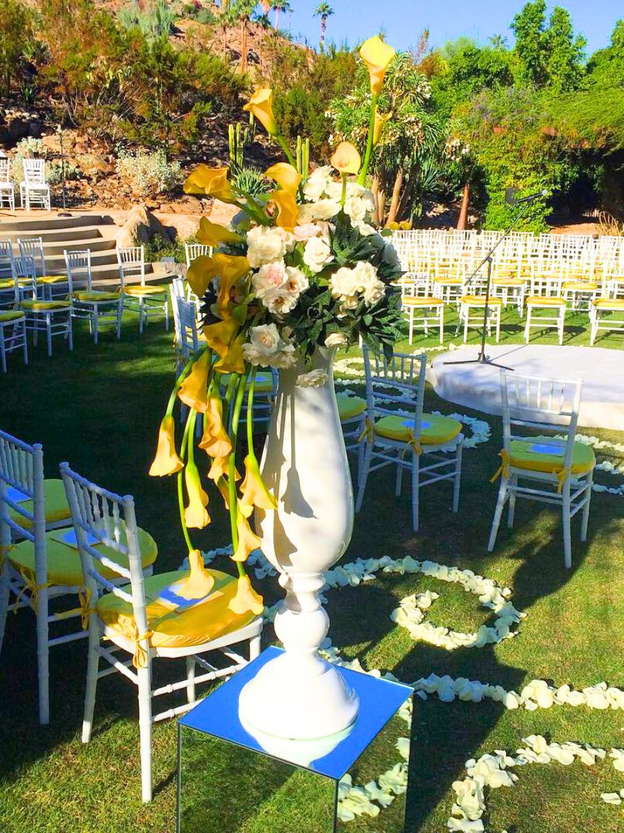 Yellow calla lilies in a wedding setting