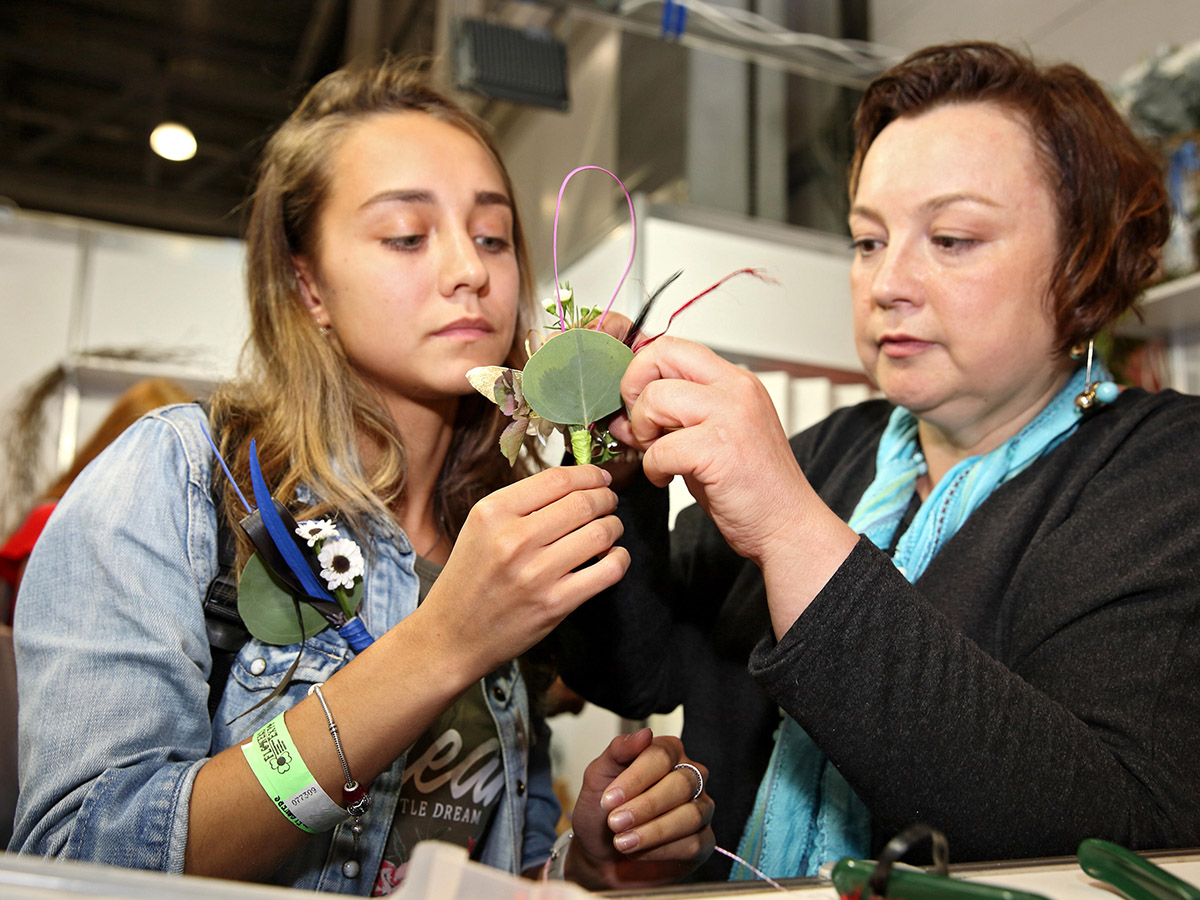 Girl and older woman at FlowersExpo Moscow