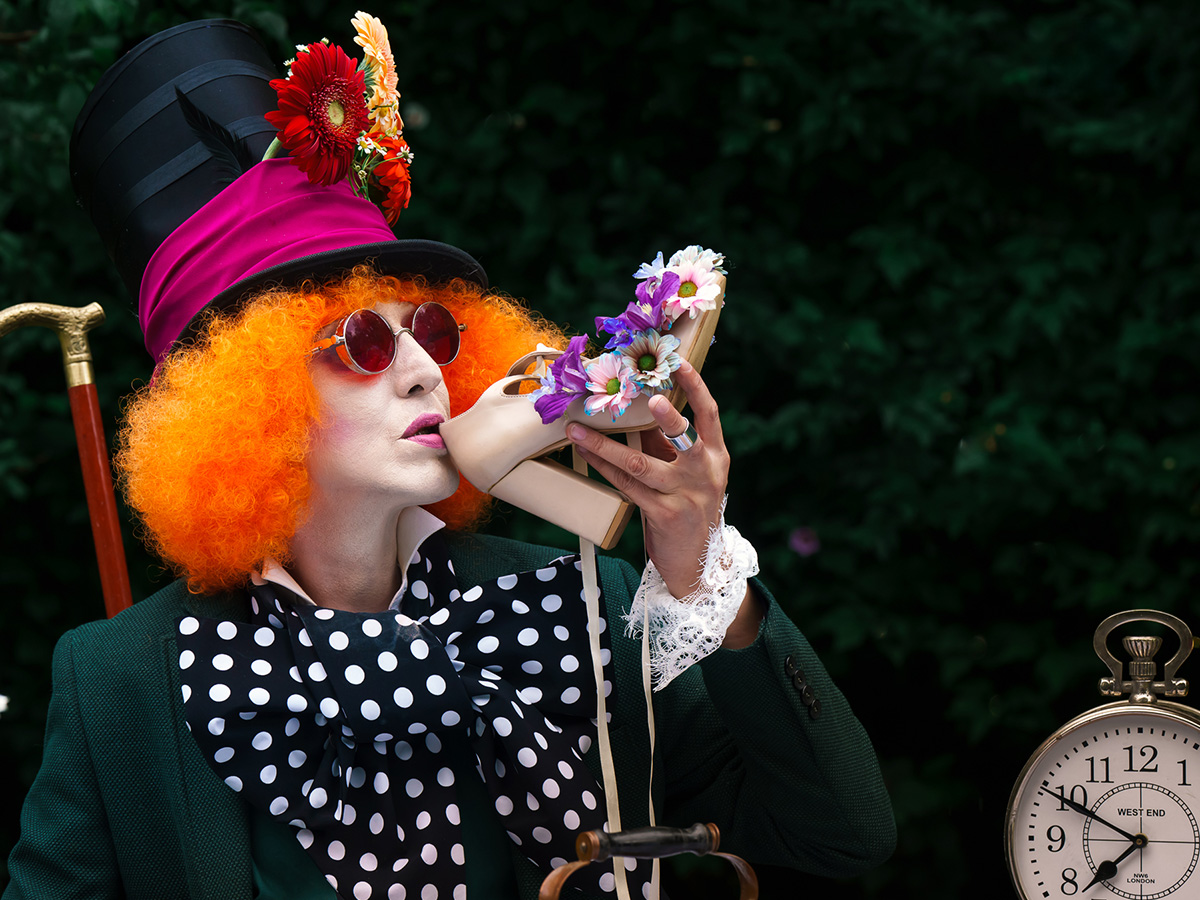 The Mad Hatter's drinking from a shoe