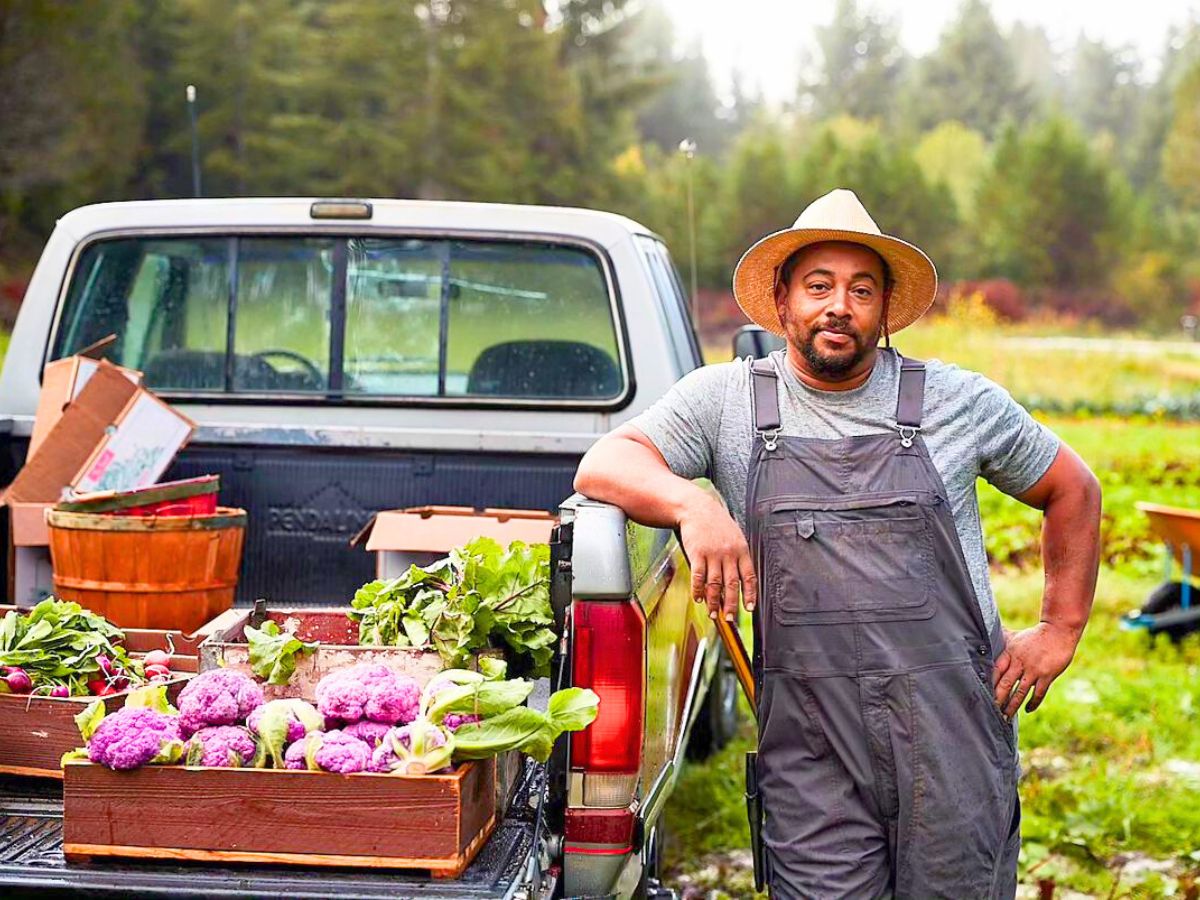 Farmer with his truck and crops