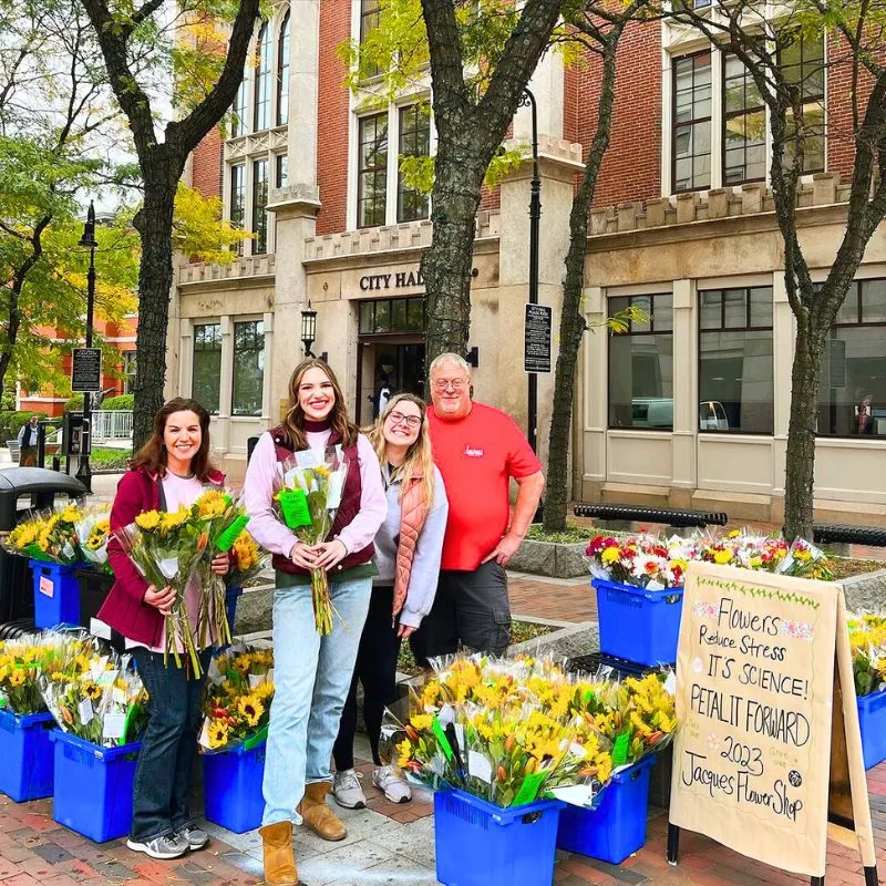 Happy people with flowers