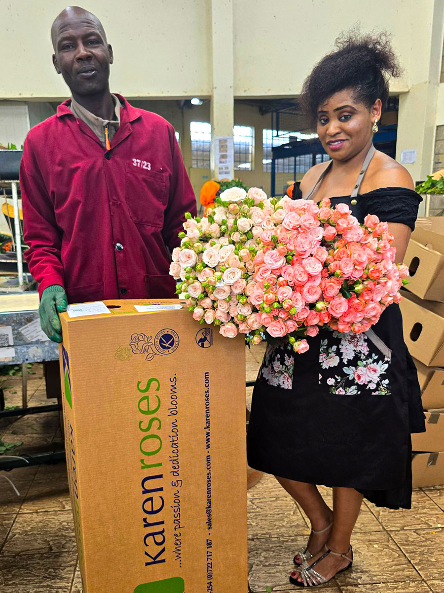 Rosemary Kimunya with Karen Roses worker