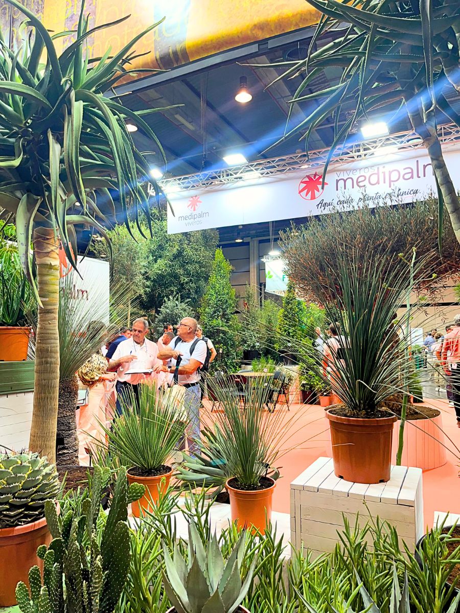 Contemplating green plants at Iberflora