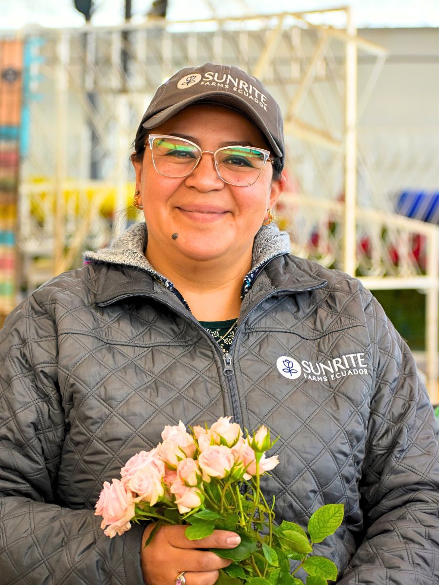 Sunrite Farms employee with spray roses