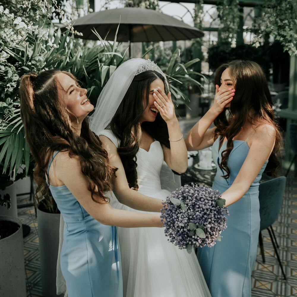 Girls enjoying bachelor party with flowers