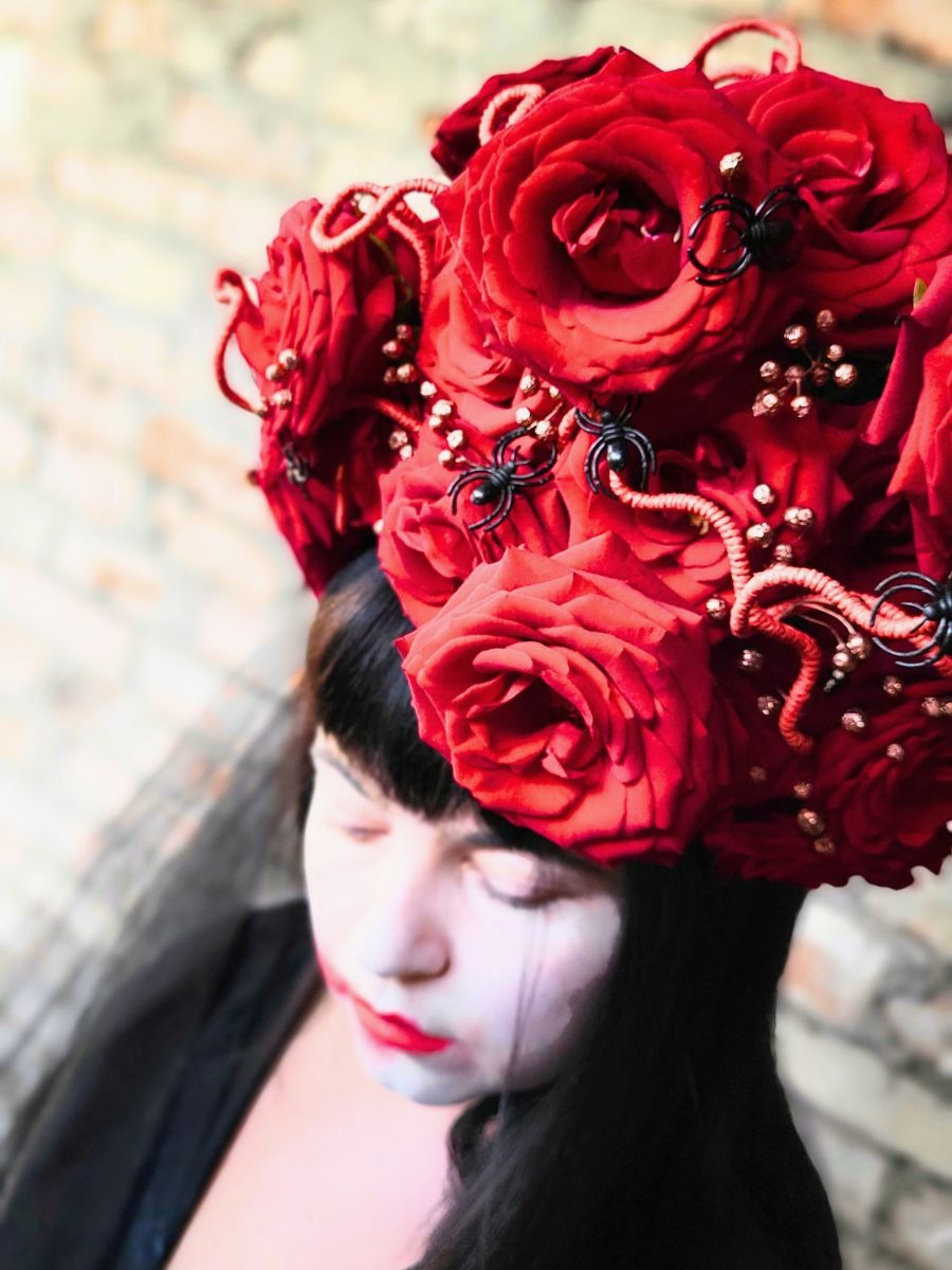 Bold red roses with spider decor