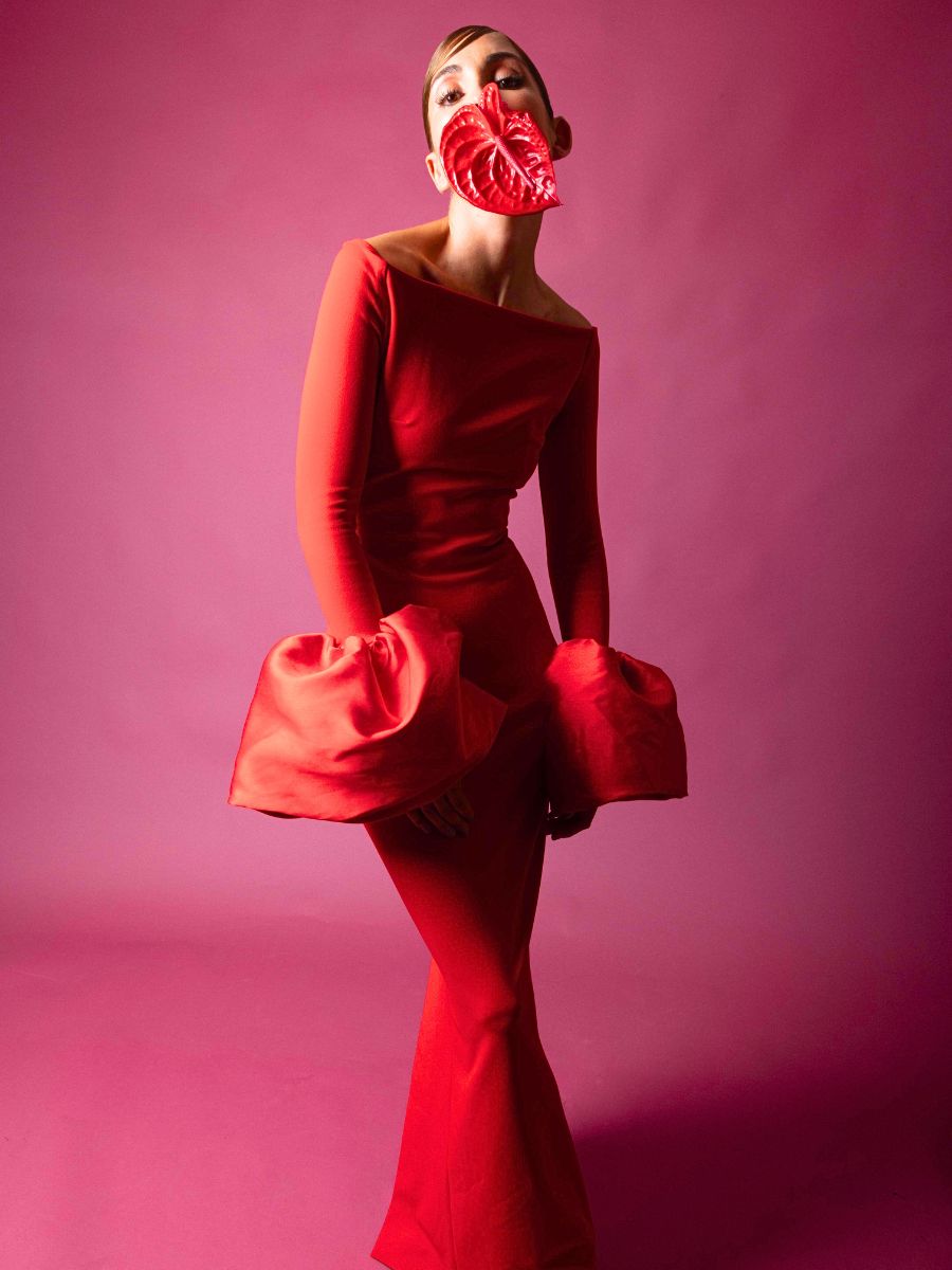 Model with red anthurium by Alina Gross