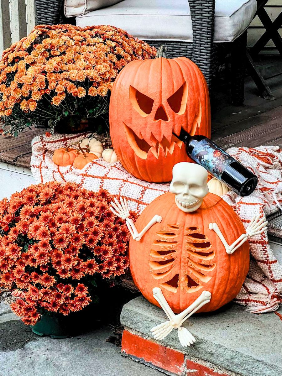 Carved pumpkins with chrysanthemum flowers