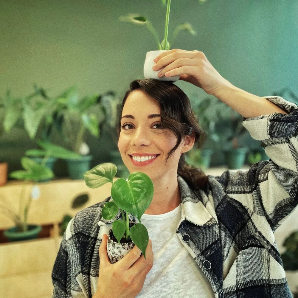 Girl put plant on head