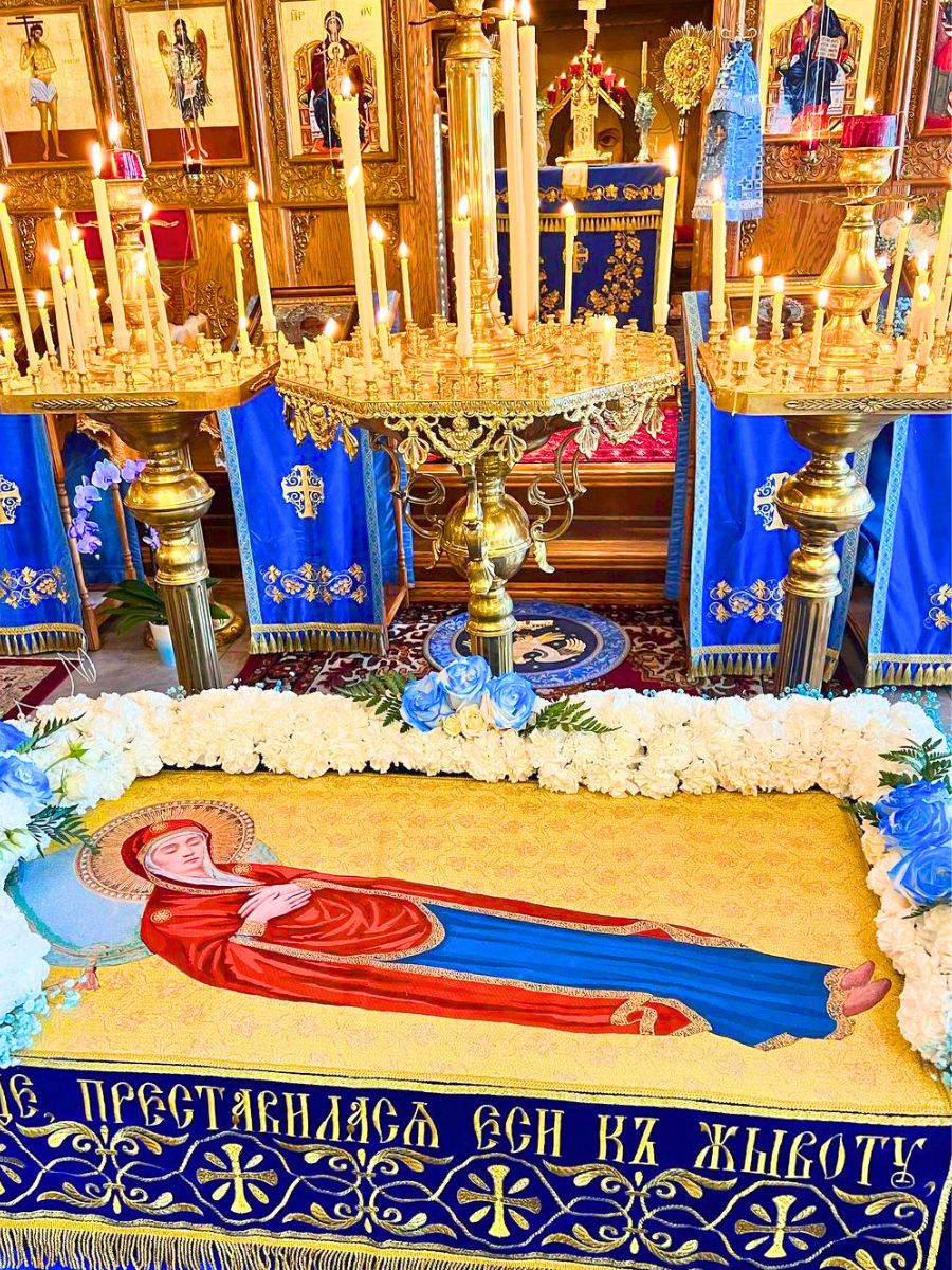 Inside church decorated with white carnations