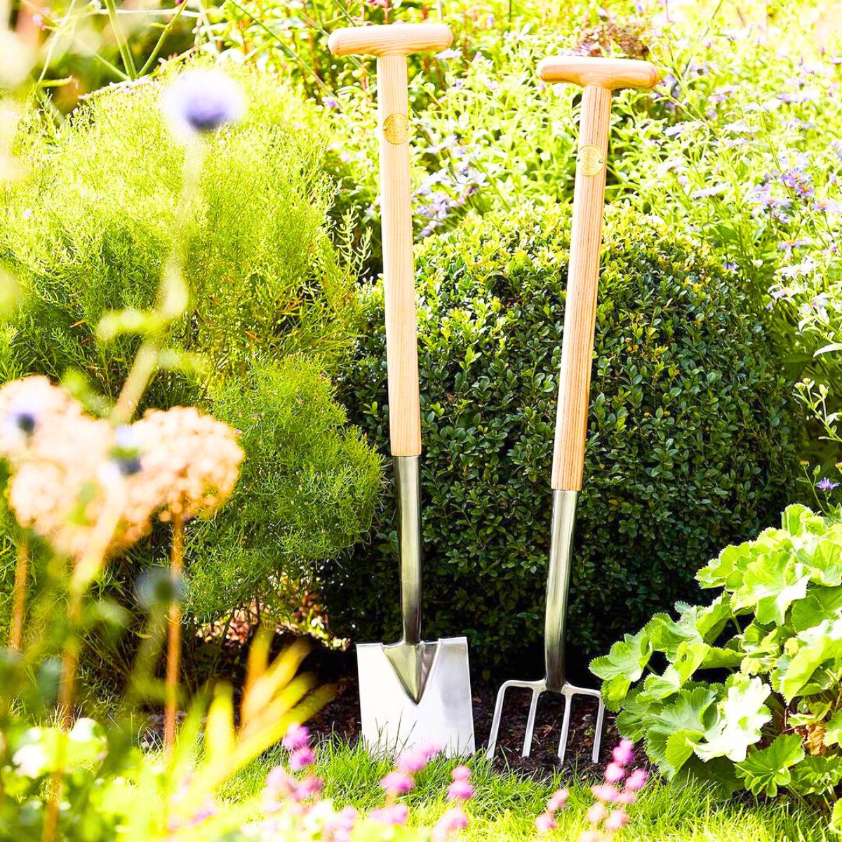 A shovel and a rake gardening tools