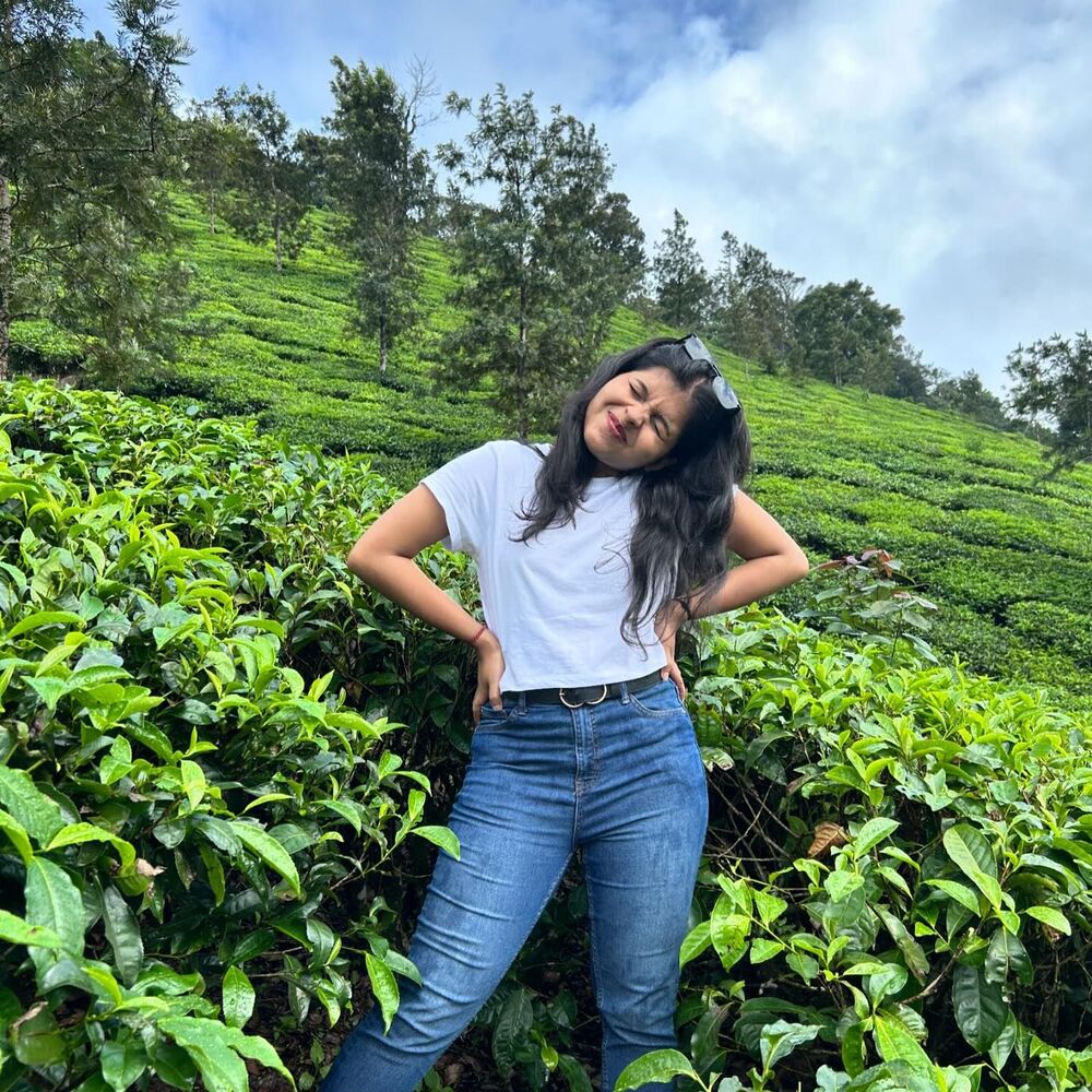 girl enjoying the nature at Coorg plant hills and tea gardens