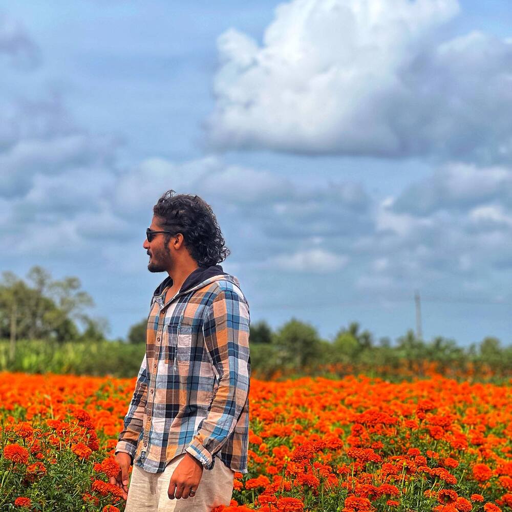 visiting Gundlupet orange flower field on your road trip to Karnataka