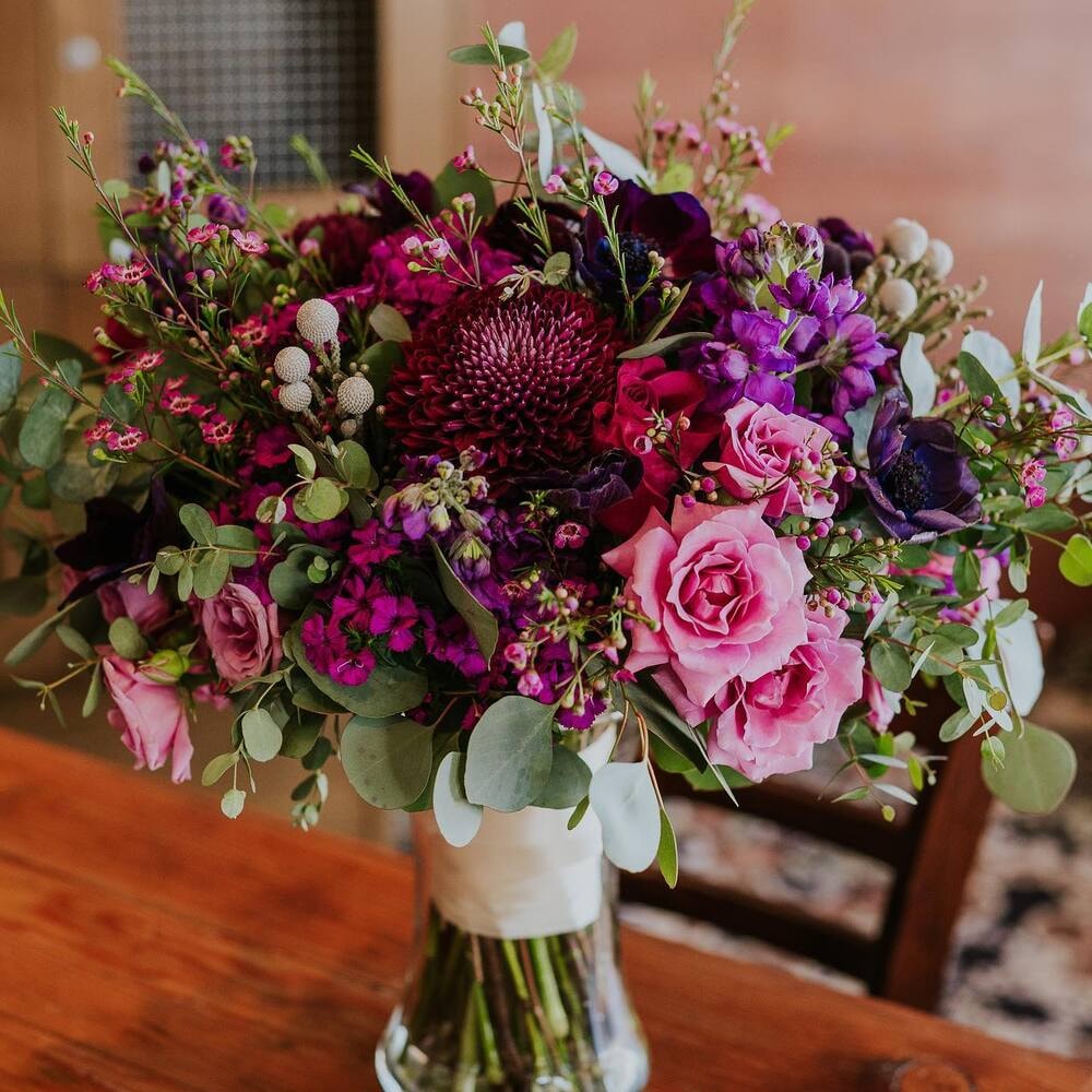 bouquet of winter wedding flowers in a vase