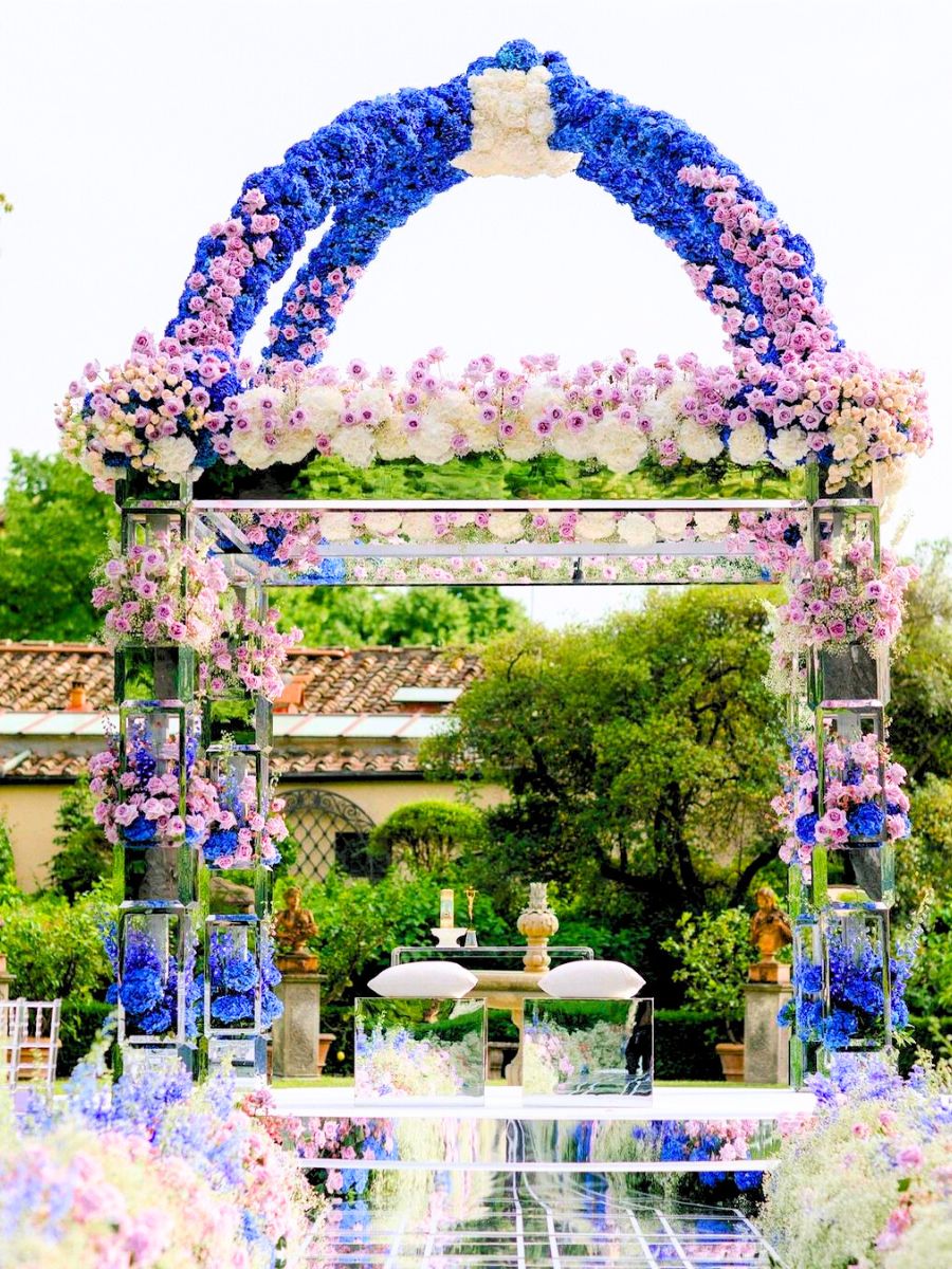 Flower arch in blue and pink shades by Sarah Haywood