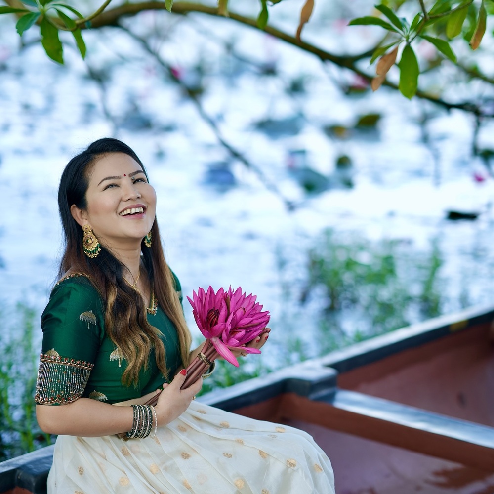 lady with red lotus flowers