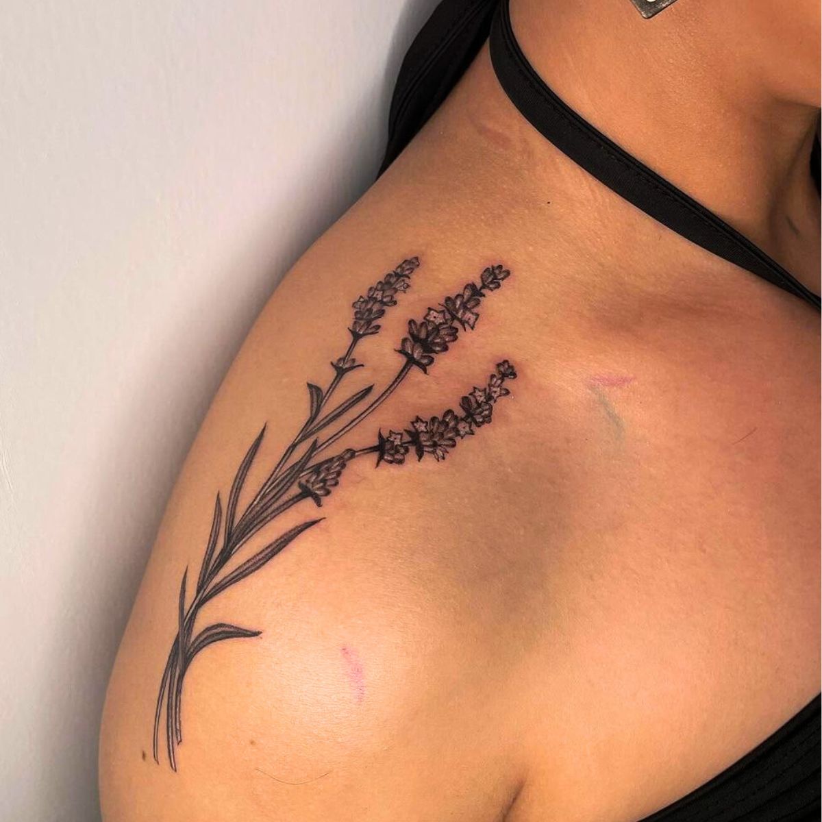 A tattoo of a lavender flower