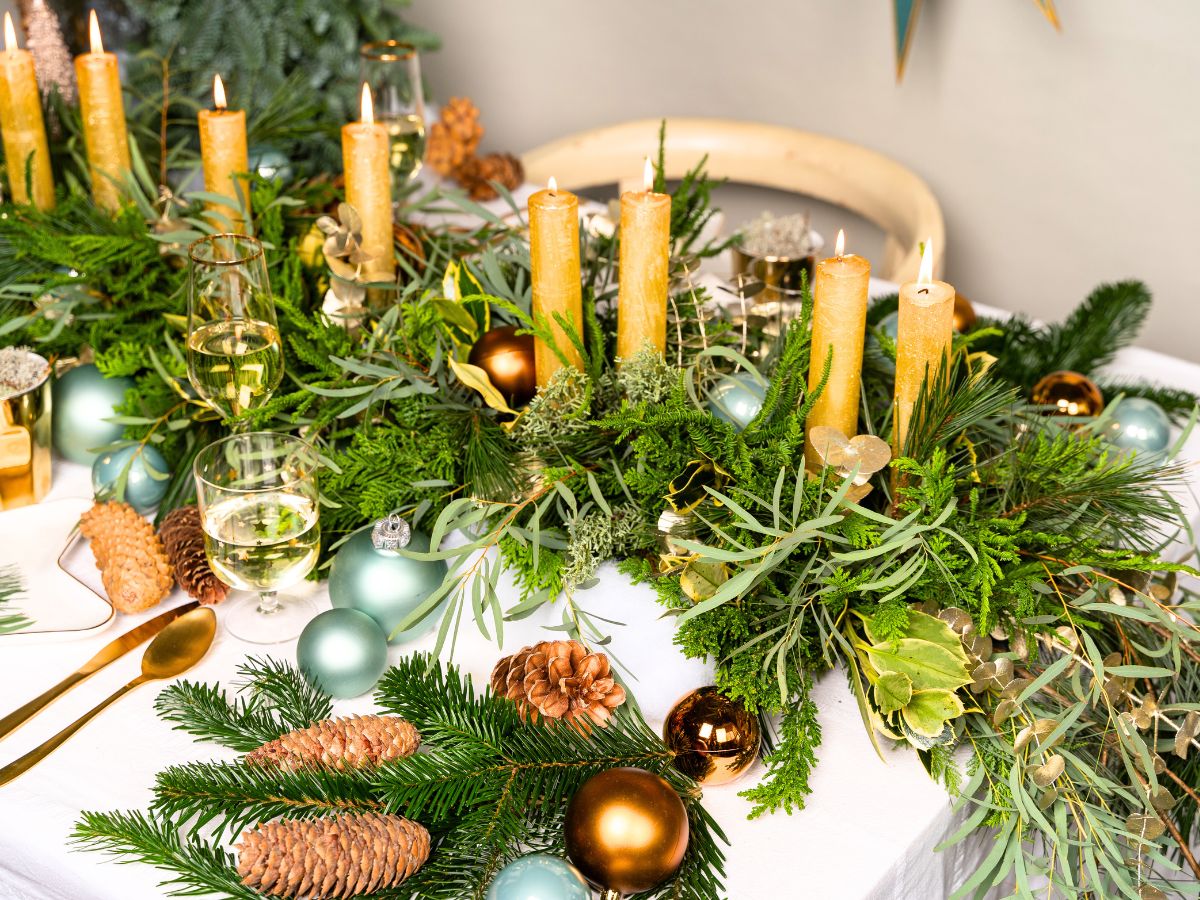 Goldish colored table decor with greens