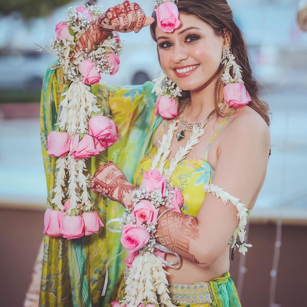 lady with flower jewelry 