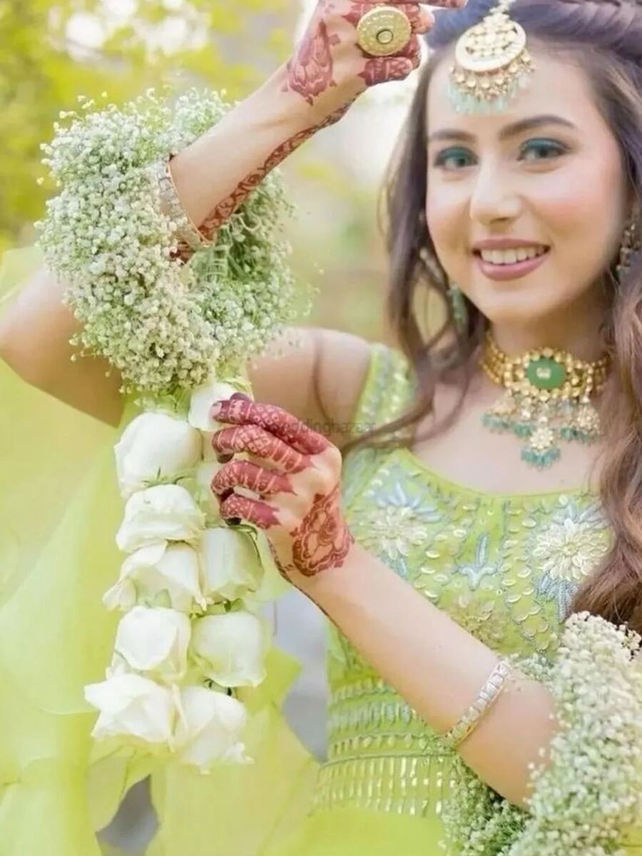 lady wearing white flower jewelry