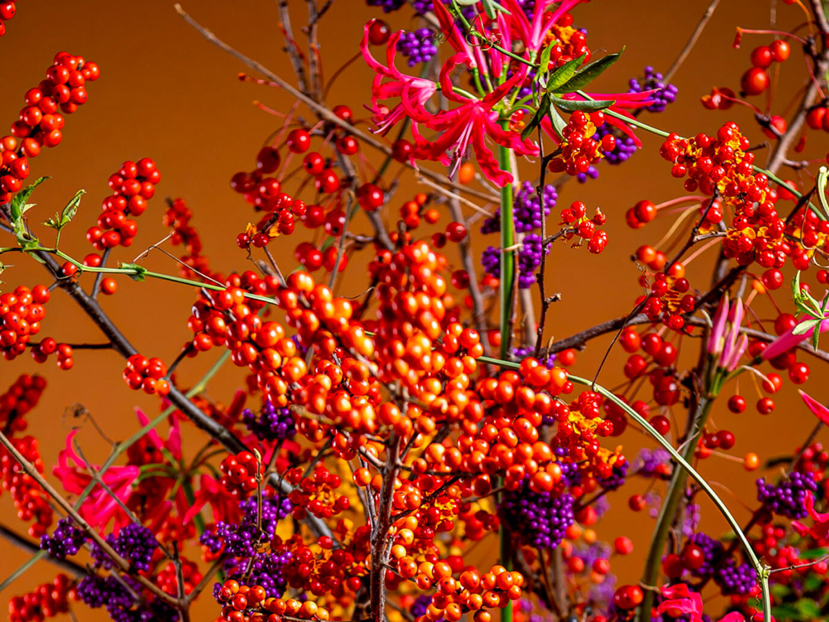 Ilex arrangement with Callicarpa and Gloriosa Radical Wonders