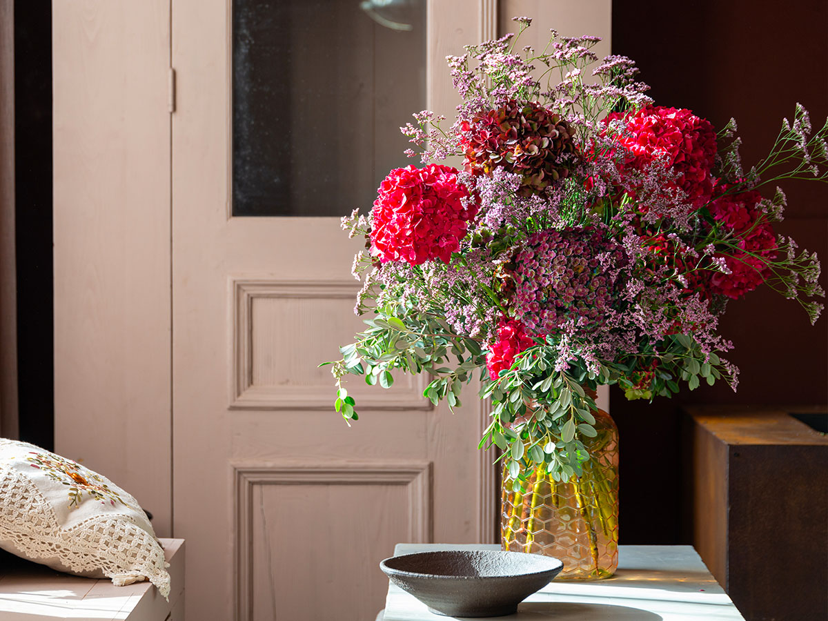 Classic deep red hydrangea bouquet on a table