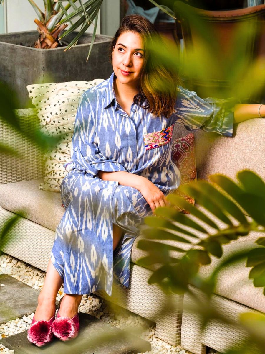 Bibi Hayat among plants on an outdoor setting