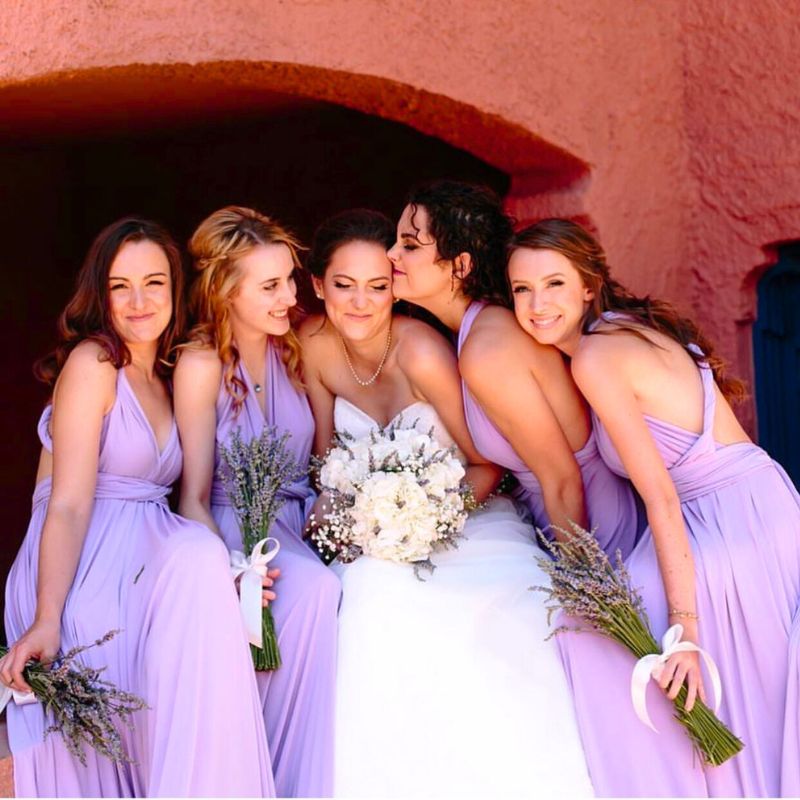 Bridesmaids in Lavender and Flowers Combined in the Trend Color