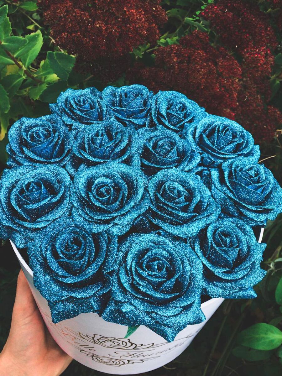 Turquoise blue toned glitter roses