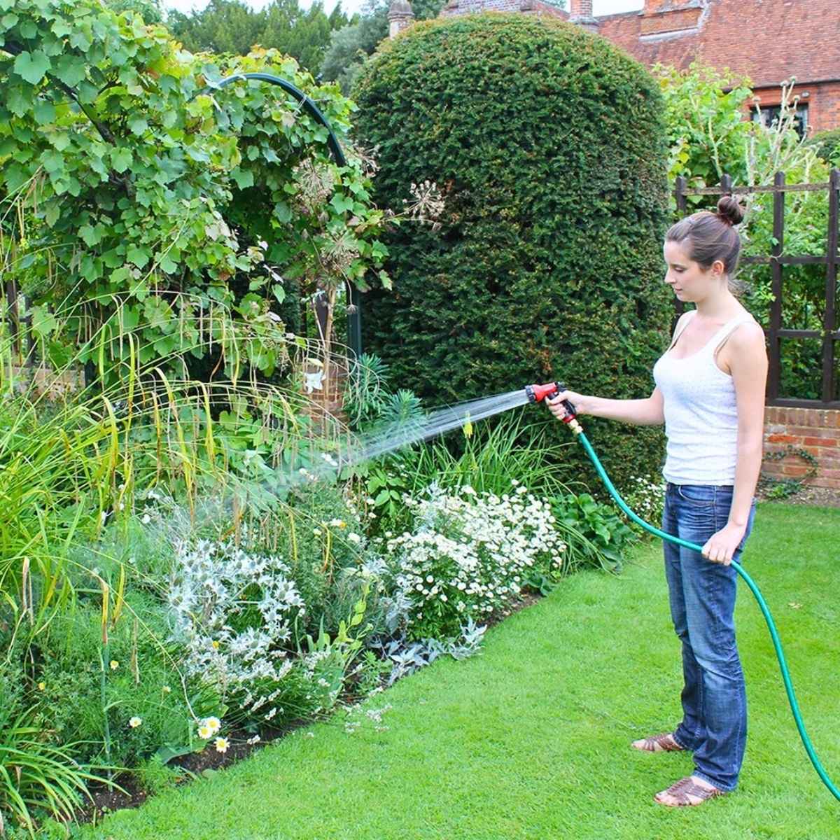 A girl taking care of her plants