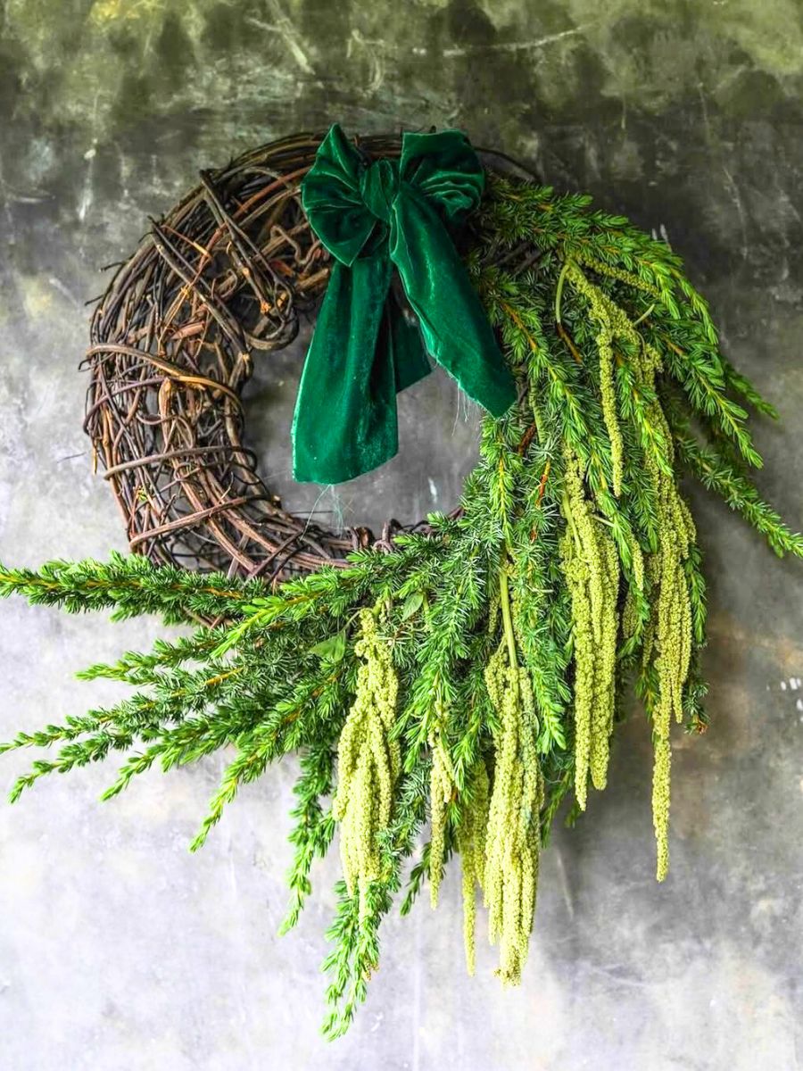 An asymmetrical wreath in tones of green