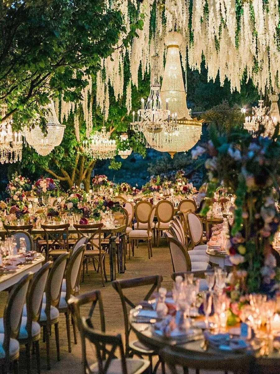 Fairytale wedding decor with crystal chandeliers