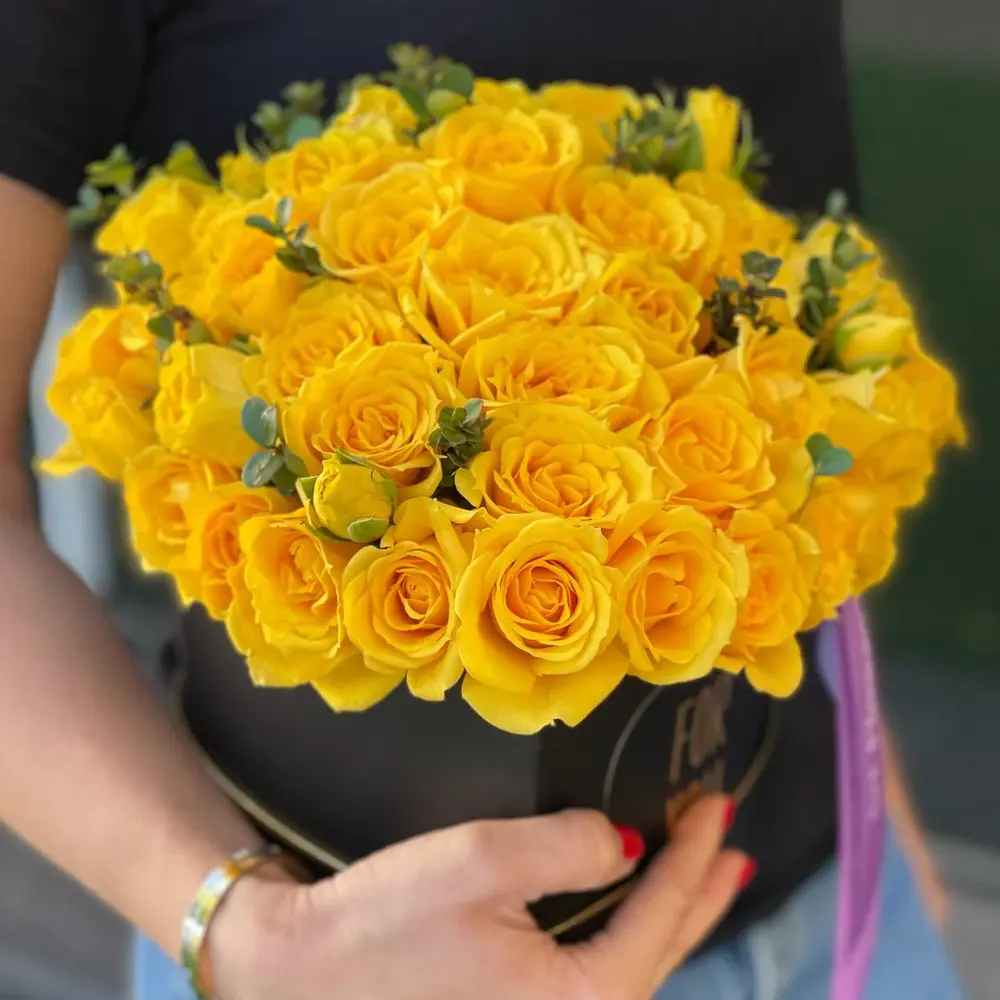 Yellow roses in a small heart box from ART Flowers LA