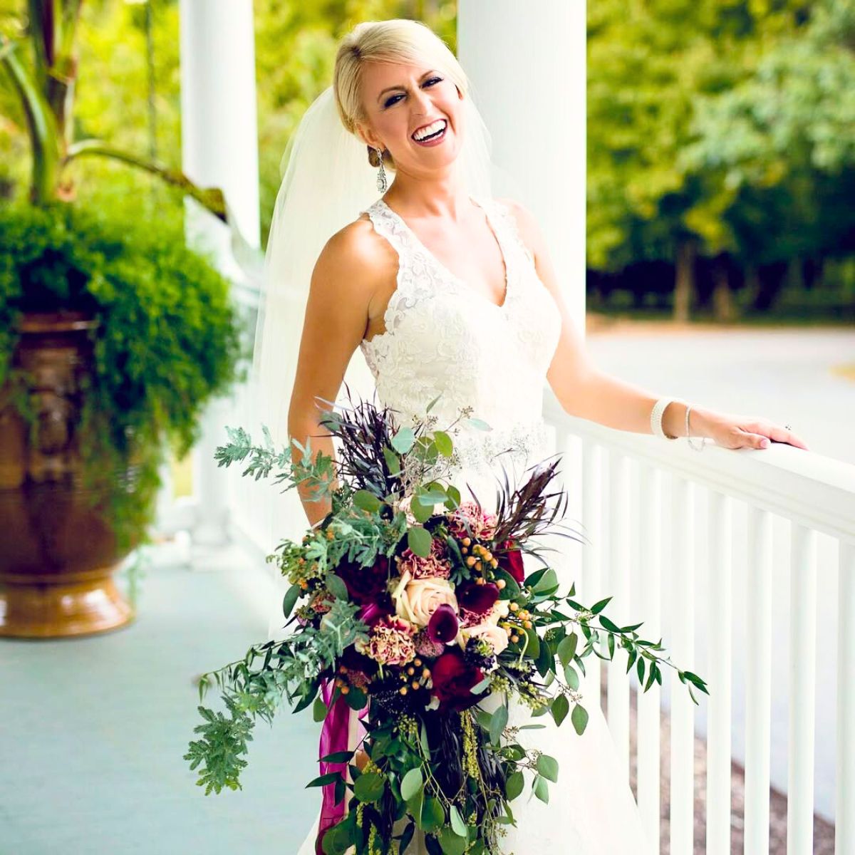 A bouquet with dark callas and foliage