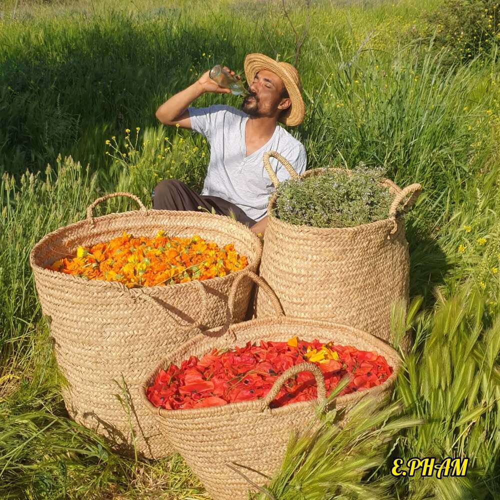 Men chilling with flower bucket