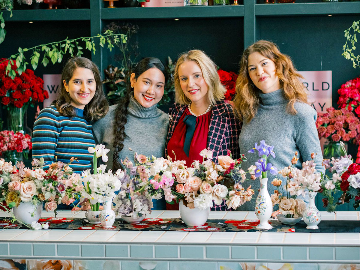 Katya Hutter and team with spray rose Christmas design