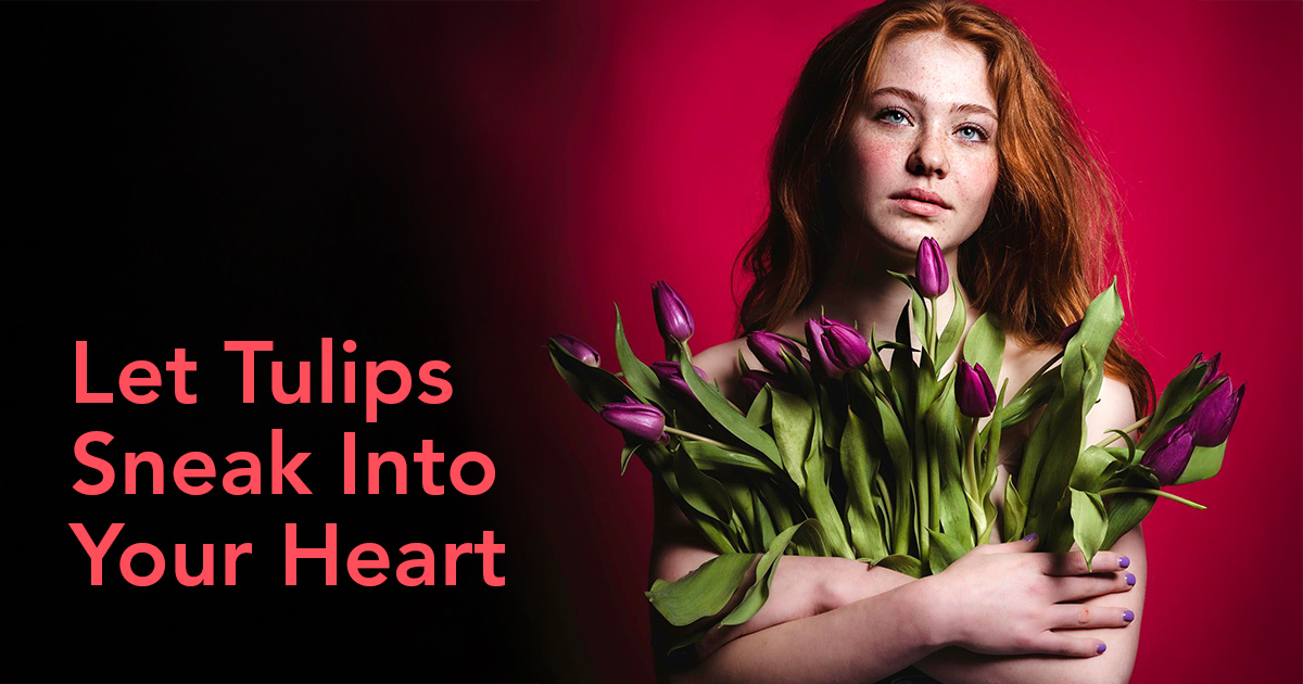 Red hair model with purple tulips