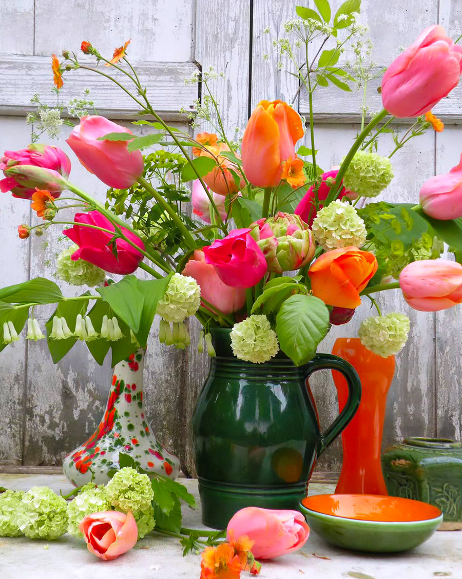 Vase with tulips and snowballs