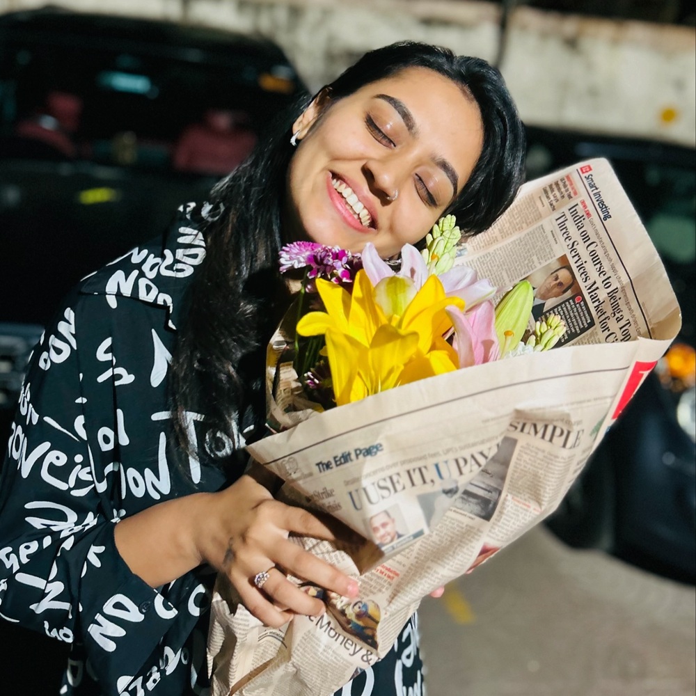 Indian lady with flower bouquet