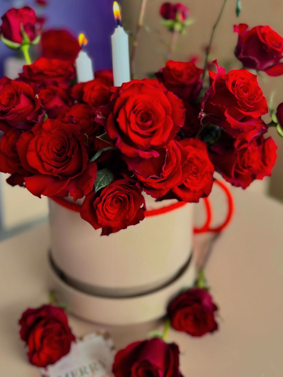 A floral arrangement using Born Free roses