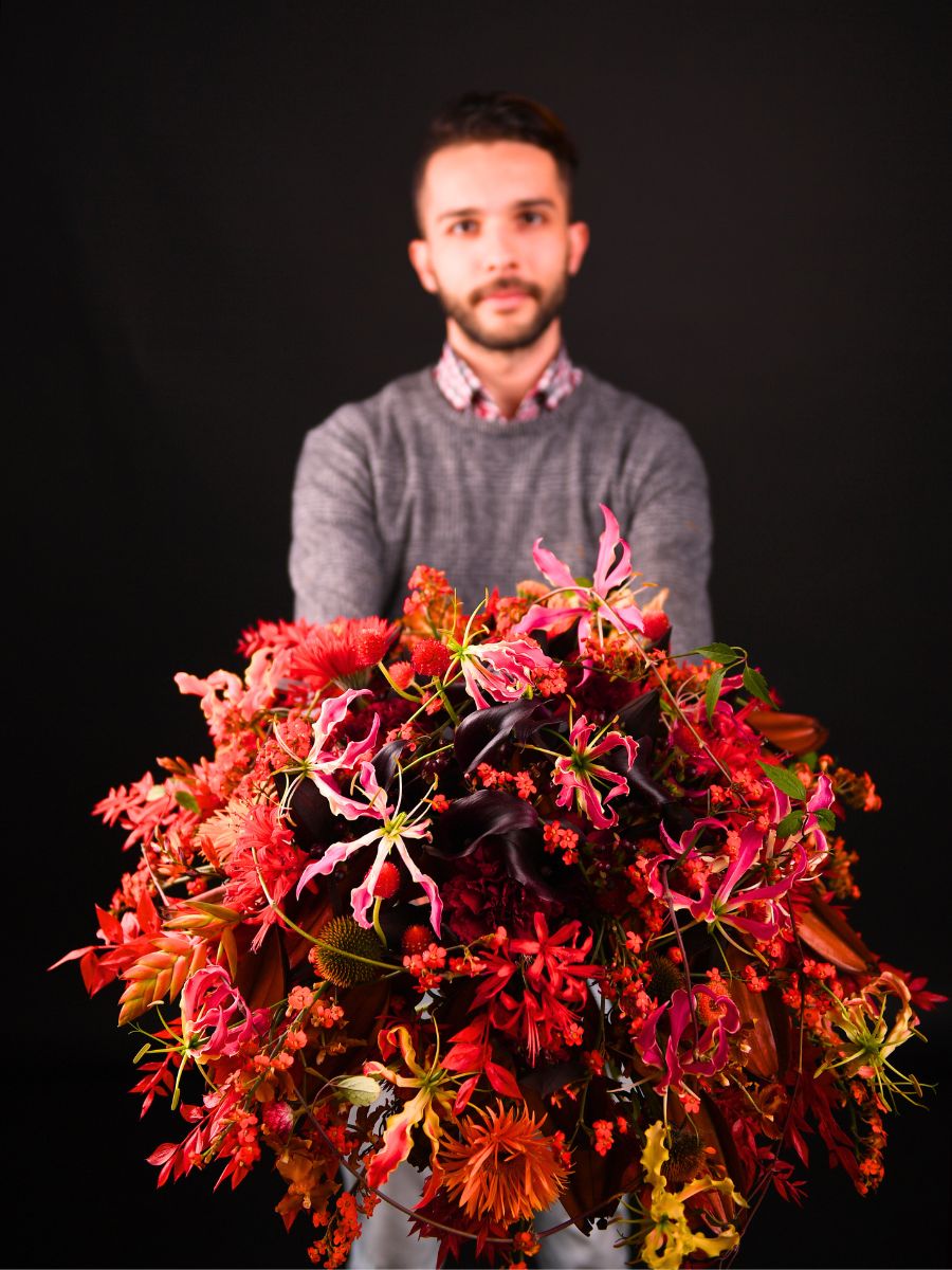 Gabor Nagy with flower arrangement