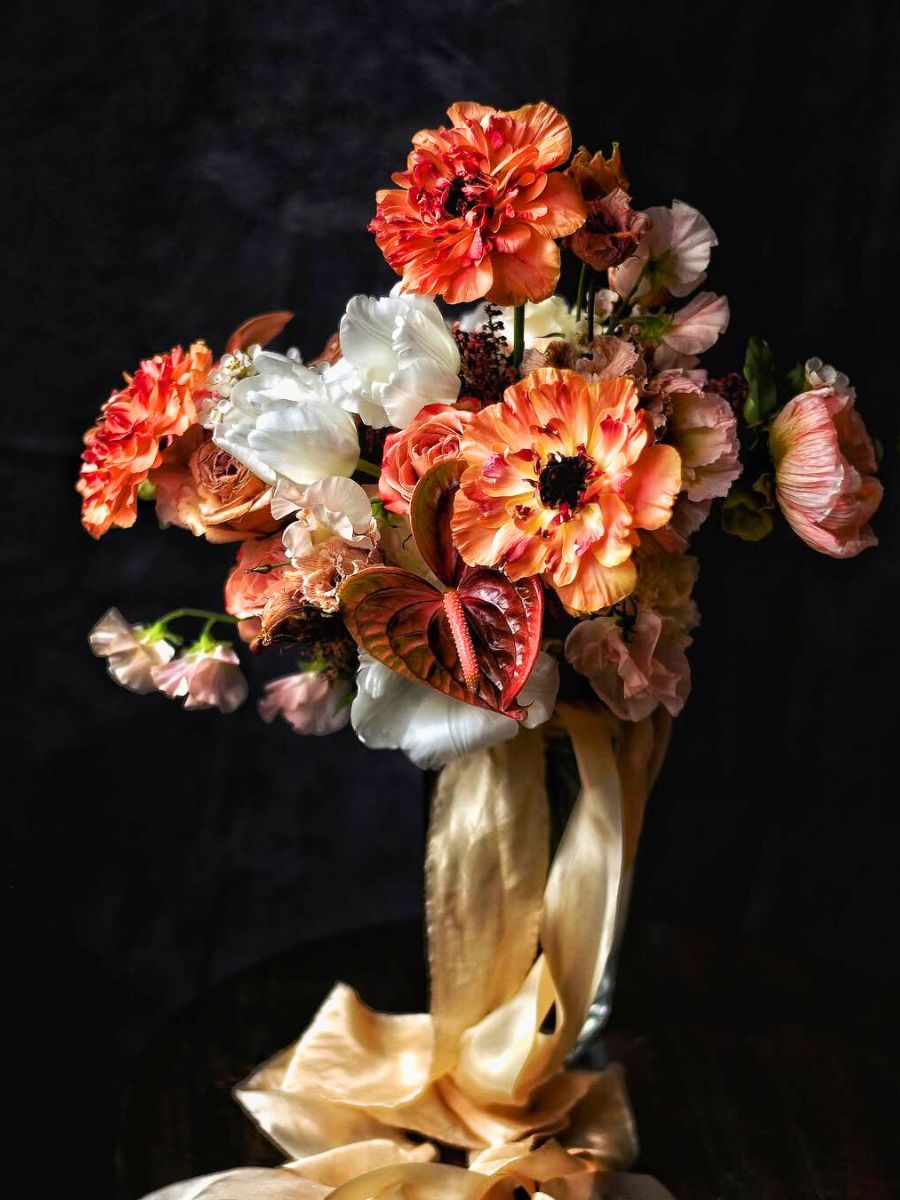 An elegant arrangement with Charlotte ranunculus