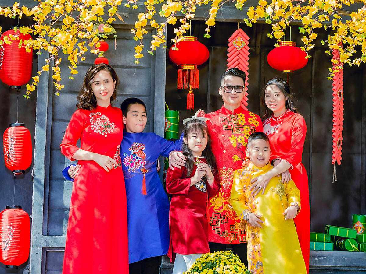 Asian family with Forsythia by Thanh Do