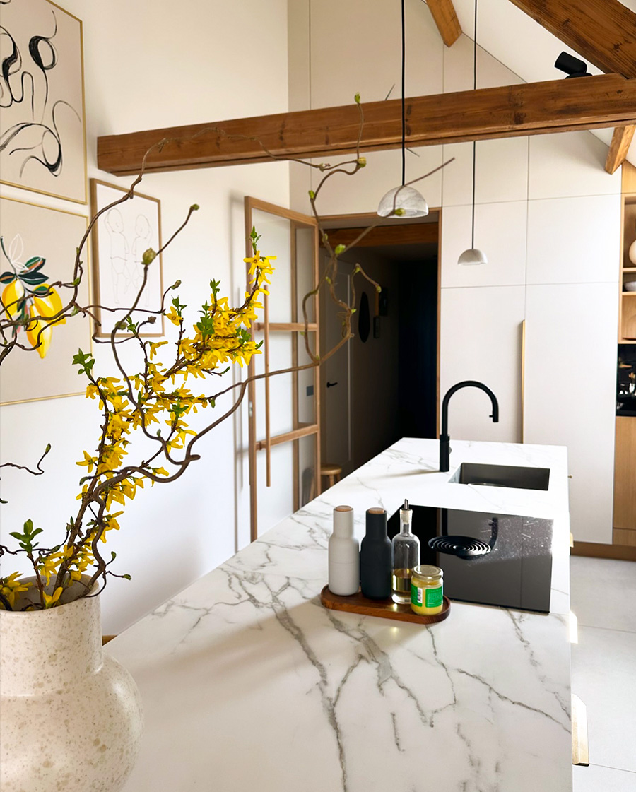 Forsythia arrangement in a kitchen