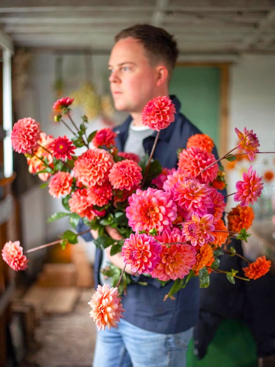 Graeme Corbett with his garden grown Dahlias