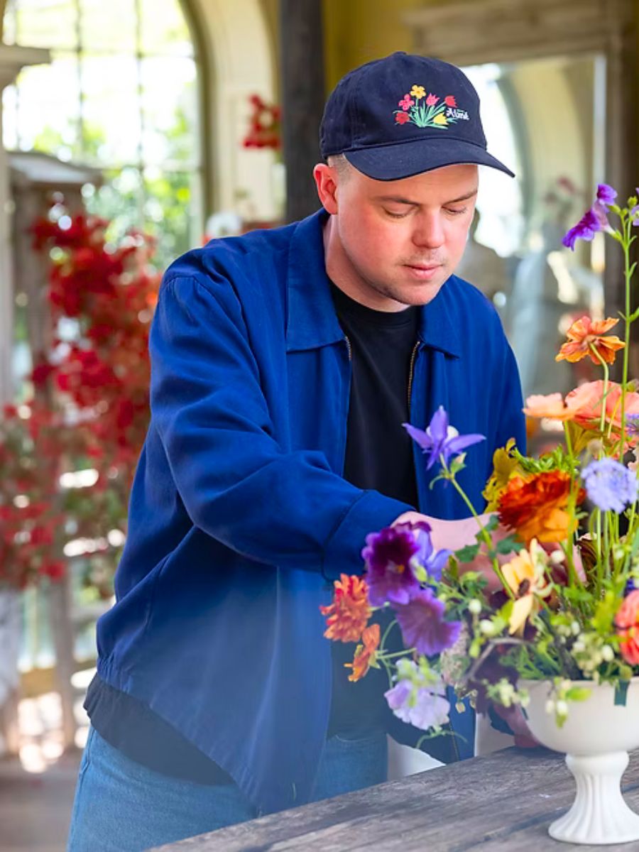 Graeme working on a floral arrangement