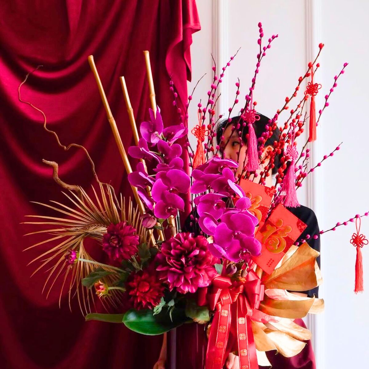 Phalaenopsis orchids in an arrangement for Chinese New Year