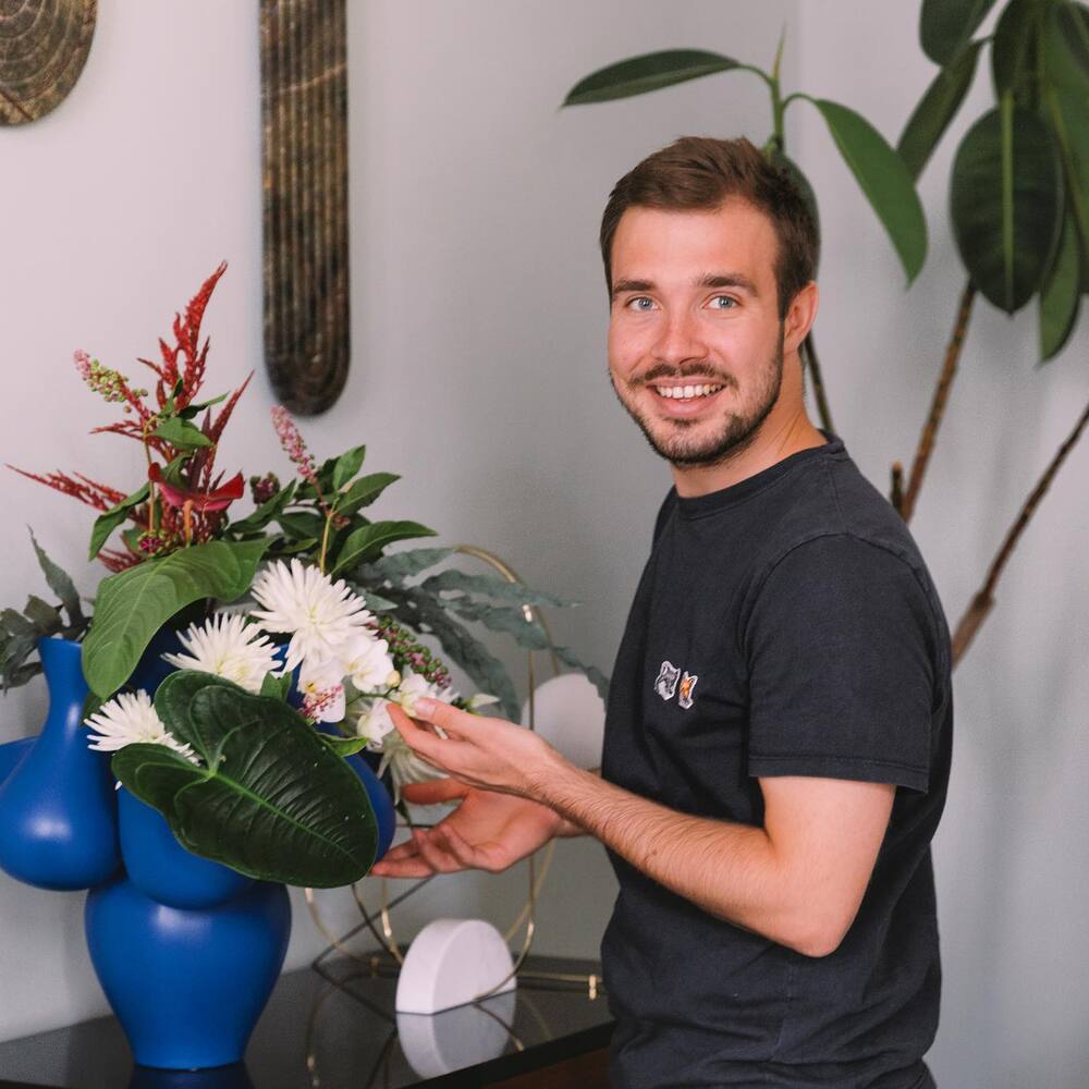 men with interior white flower